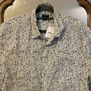 J Crew men’s casual button down size large washed fit. Floral print